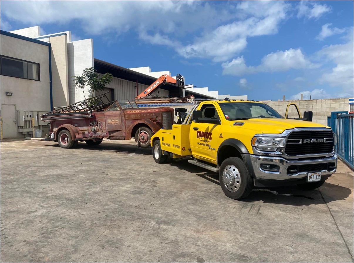 Tadio's tow truck on a Honolulu street